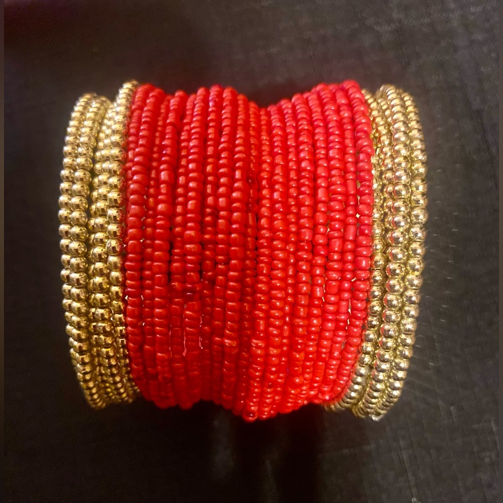 Red and gold bead bracelet